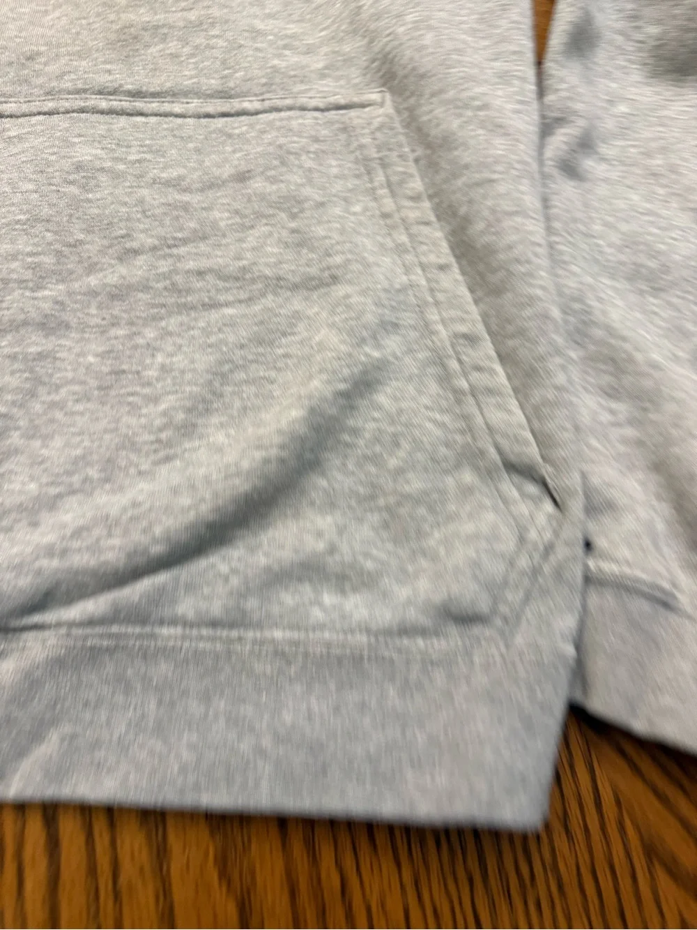 Nike Light Gray Pullover Hoodie with NIKE FOOTBALL Graphic